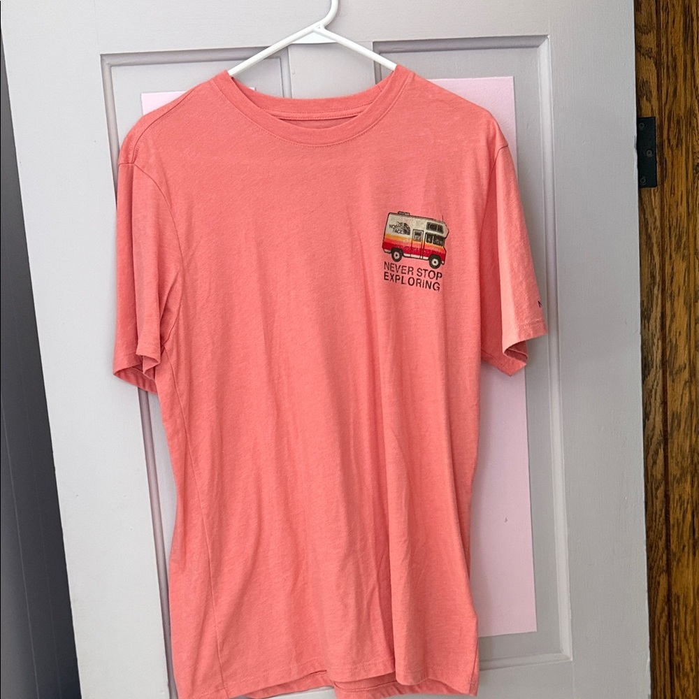 north face never stop exploring tee